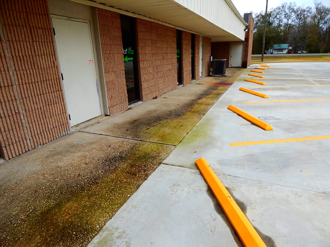 Cajun Soft Wash commercial brick cleaning soft power was dirt stains