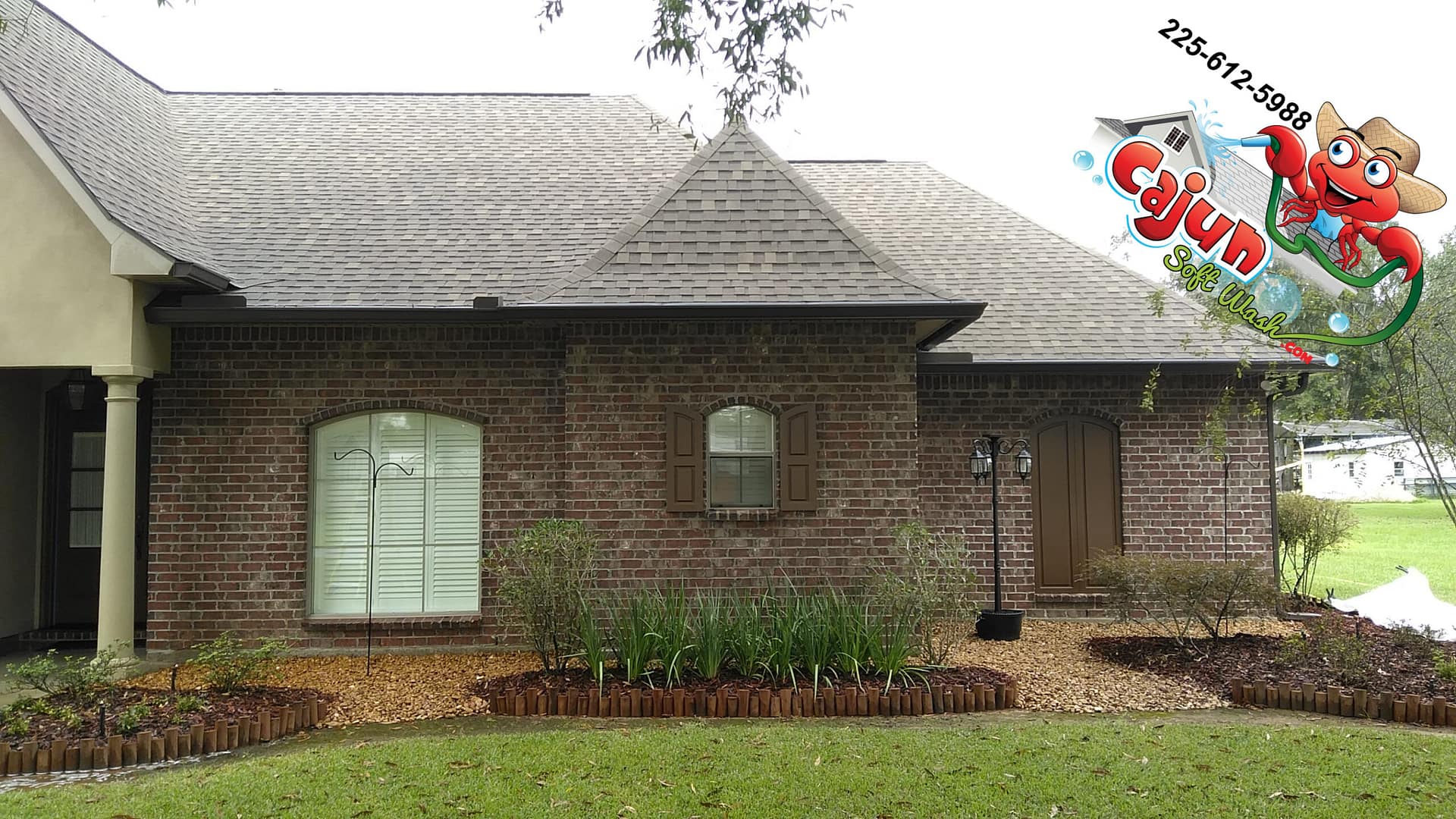 Cajun Soft Wash residential roof cleaning exterior dirt stain window