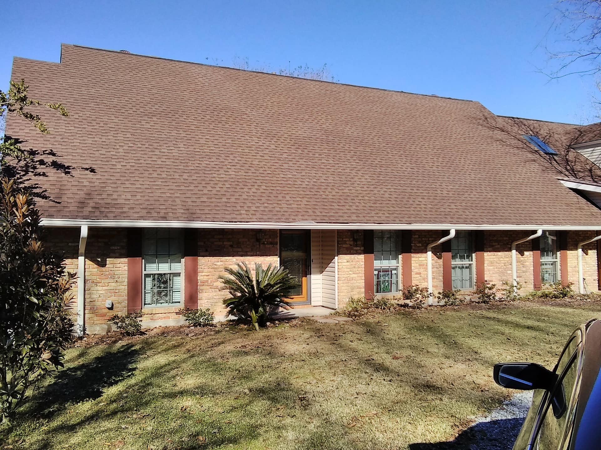 Cajun Soft Wash residential roof cleaning exterior dirt window