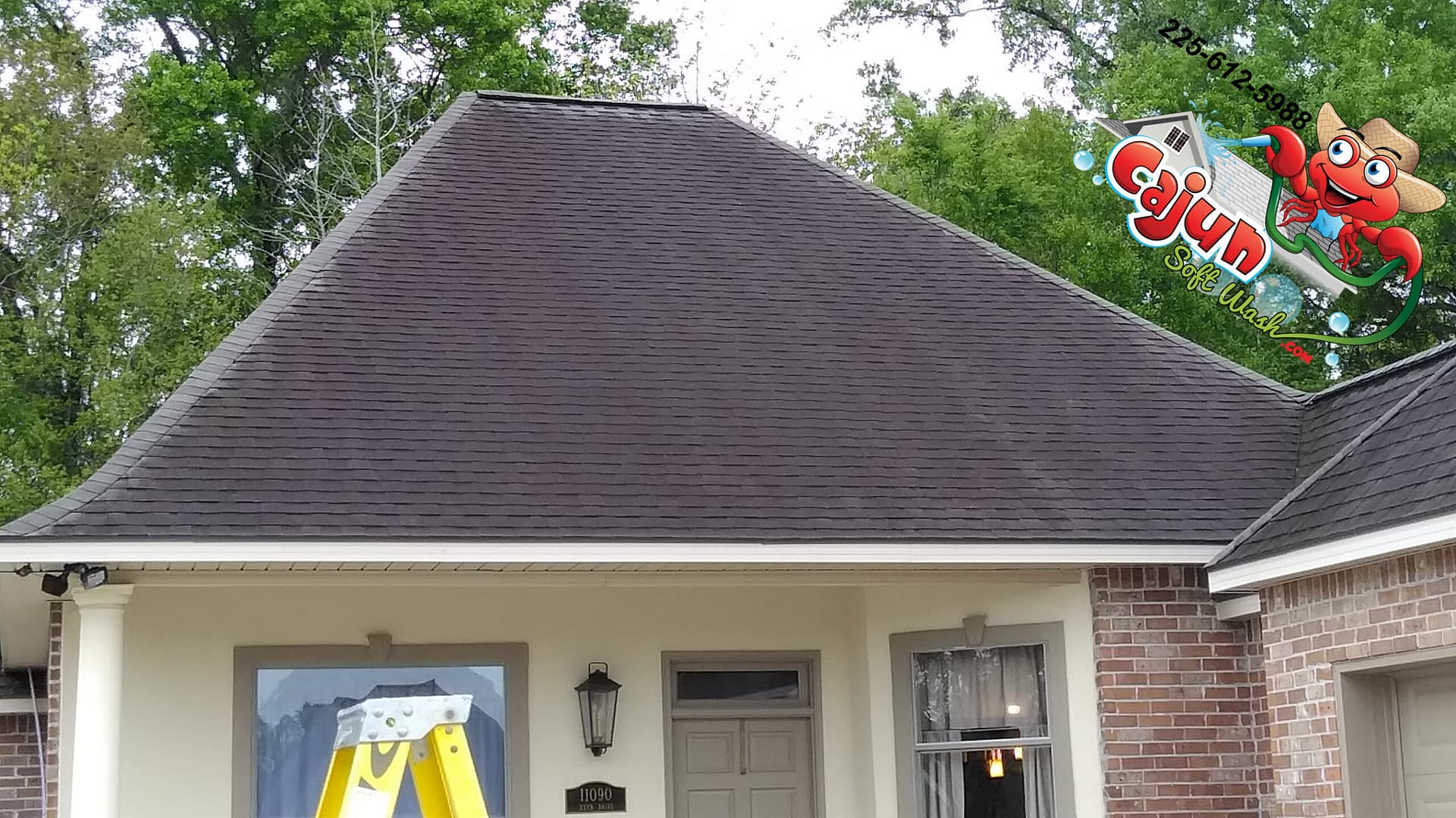 Cajun Soft Wash residential roof cleaning exterior dirt stain window