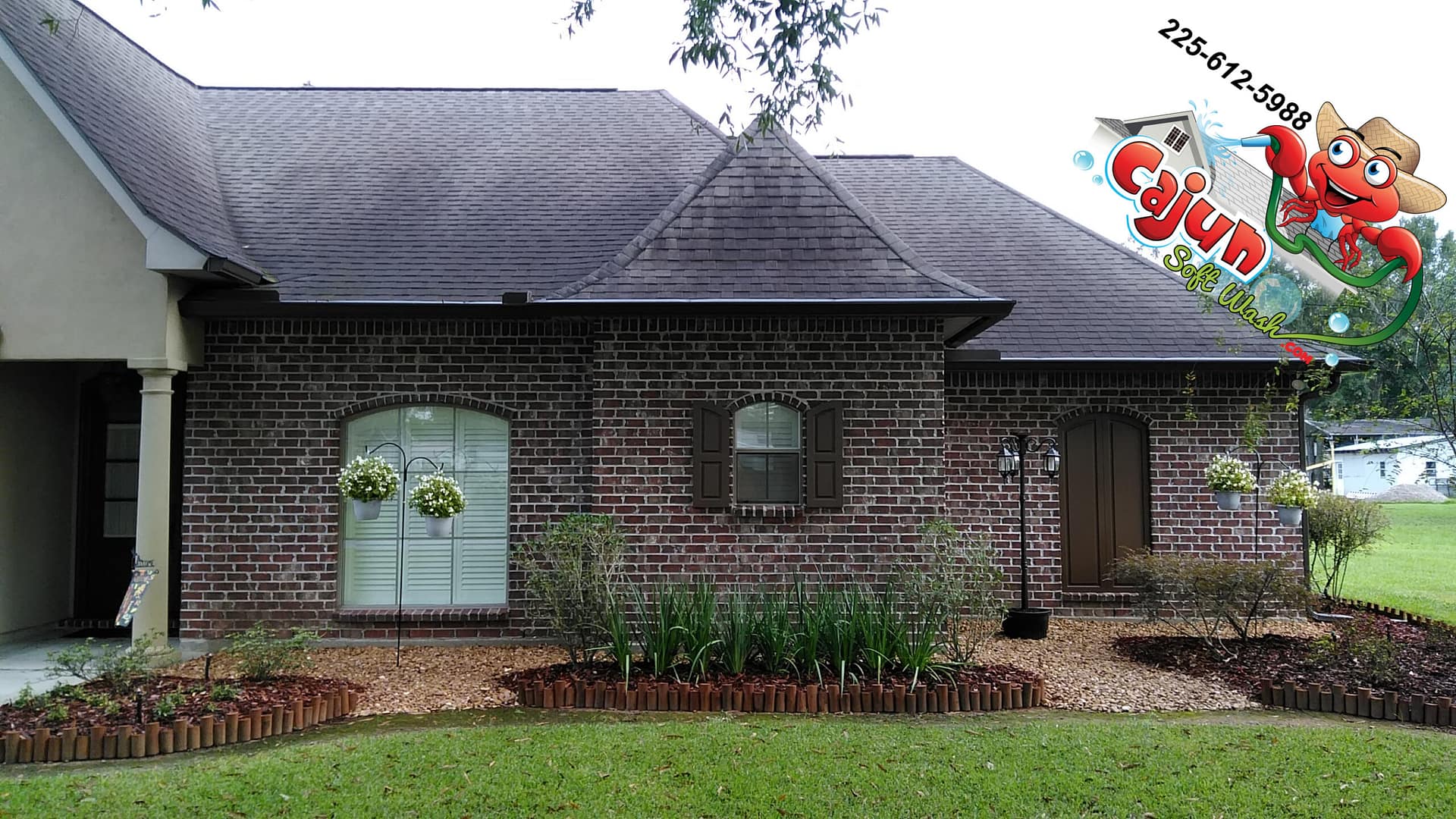 Cajun Soft Wash residential roof cleaning exterior dirt stain window