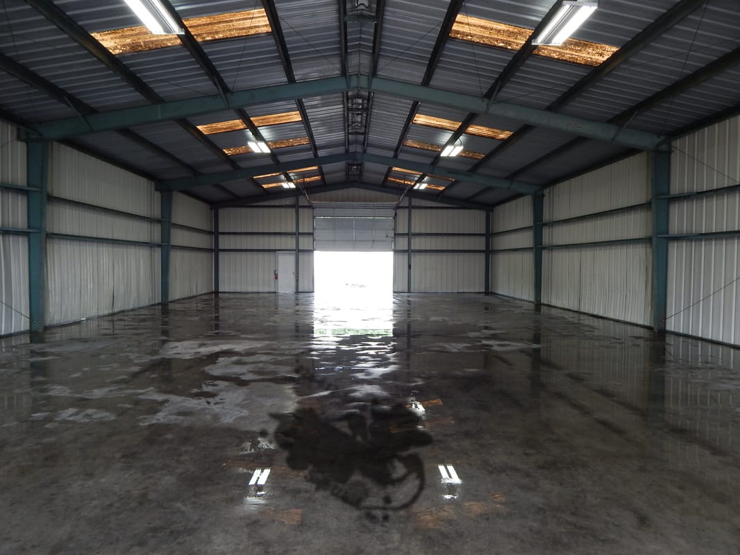 Cajun Soft Wash warehouse cleaning dirt stains